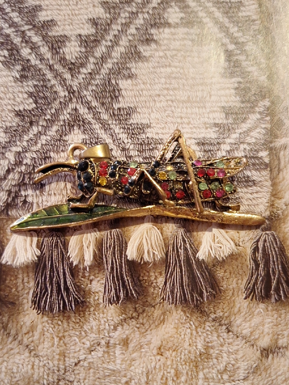 Gold-Tone Jeweled Grasshopper Brooch with Leaf
